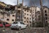 An apartment building damaged following a shelling on the town of Irpin, 26 kilometers west of Kyiv, Ukraine, Friday, March 4, 2022. (AP Photo/Oleksandr Ratushniak)