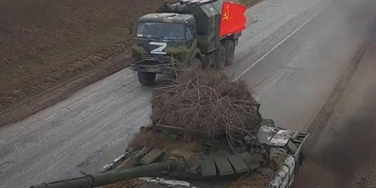 Russian military vehicles are flying Soviet hammer and sickle flags in Ukraine