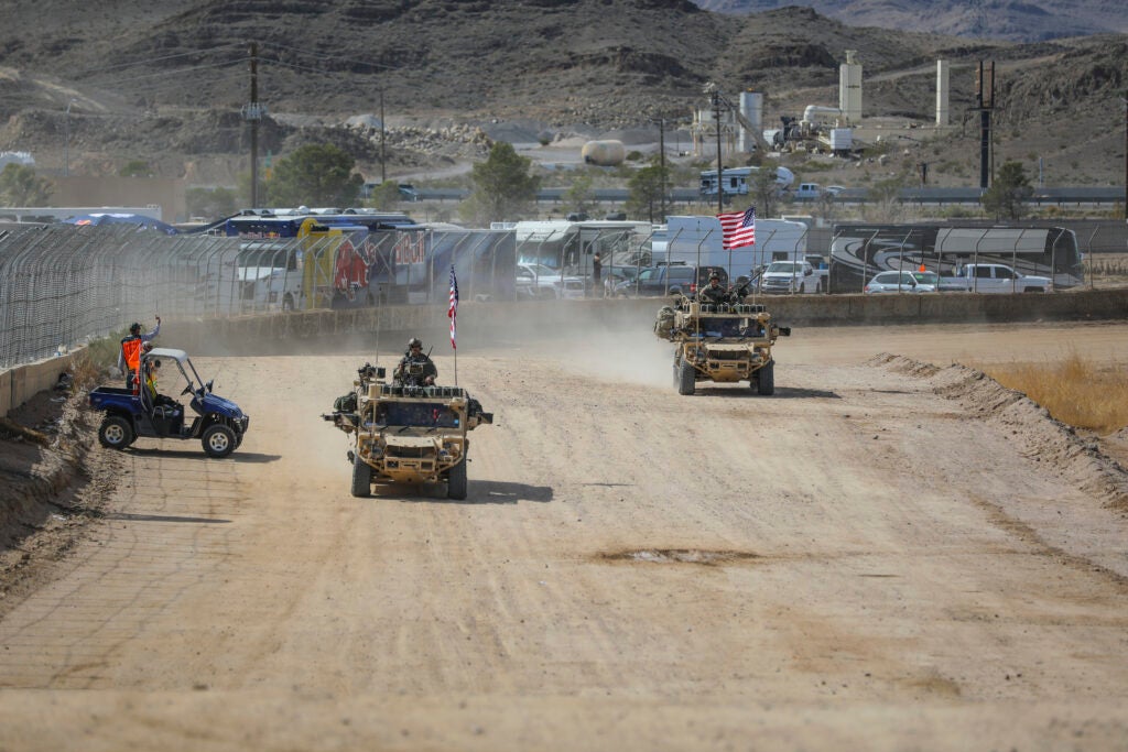 Green Berets with the 5th Special Forces Group (Airborne), drive their Ground Mobility Vehicle 1.1s to their starting positions prior to racing in the Mint 400, March 06, 2020, in Primm, Nevada. (U.S. Army photo by Staff Sgt. Justin Moeller, 5th SFG(A) Public Affairs)