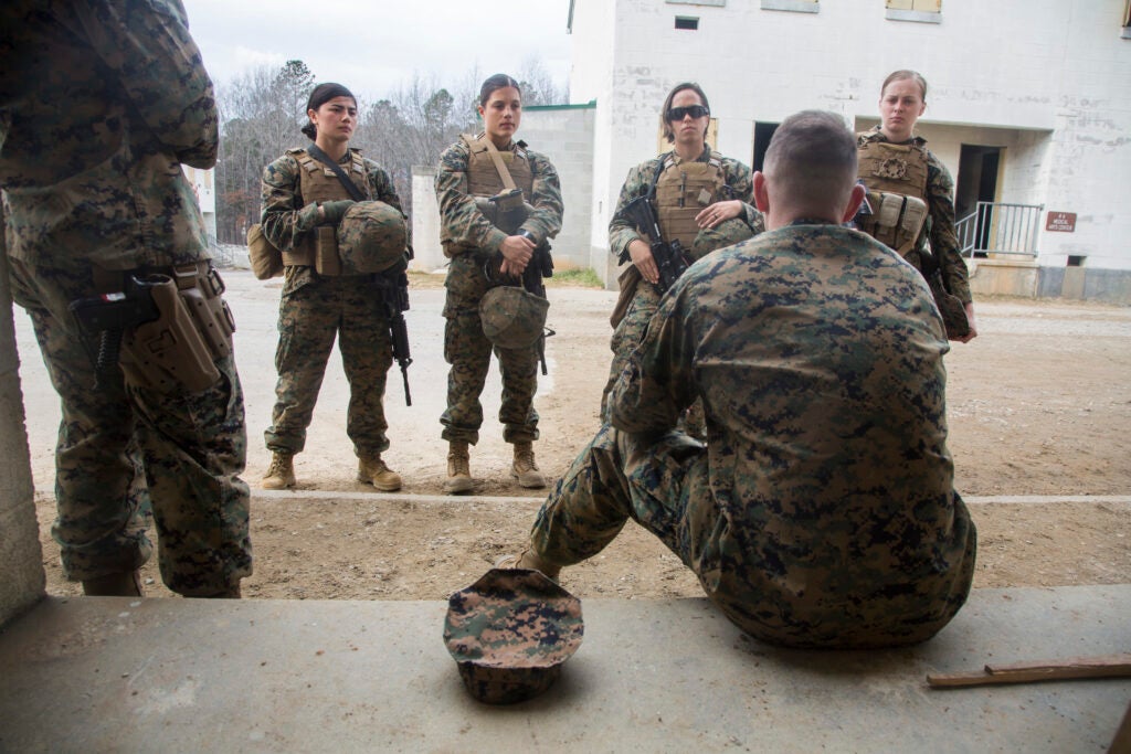 U.S. Marine Corps Col. Todd P. Simmons, commanding officer of 22nd Marine Expeditionary Unit (MEU) speaks to Marines with the Female Engagement Team (FET) at Fort Pickett, Va., Feb. 21, 2016. The FET participated in the training in preparation for a future deployment. (U.S. Marine Corps photo by Lance Cpl. Koby I. Saunders / 22 Marine Expeditionary Unit / Released)
