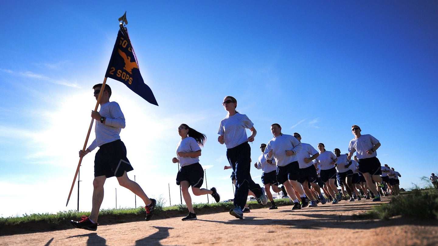 Members of the 50th Space Wing participate in the monthly Warfit Run at Schriever Air Force Base, Colorado. (U.S. Air Force/Dennis Rogers)