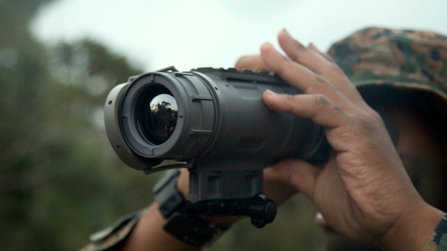 A U.S. Marine looks through a thermal scope during a thermal and night vision optics class at the Jungle Warfare Training Center in Okinawa, Japan, Oct. 19, 2018. 