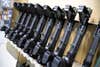 KelTec 9mm SUB2000 rifles, similar to ones the company is shipping to Ukraine, are lined up in a testing room at a manufacturing facility in Cocoa, Fla., on Thursday, March 17, 2022. The family-owned gun company was left holding a $200,000 shipment of semi-automatic rifles after a longtime customer in Odesa suddenly went silent during Vladimir Putin’s invasion of Ukraine. The company decided to send them to Ukraine's nascent resistance movement. (AP Photo/Phelan M. Ebenhack)