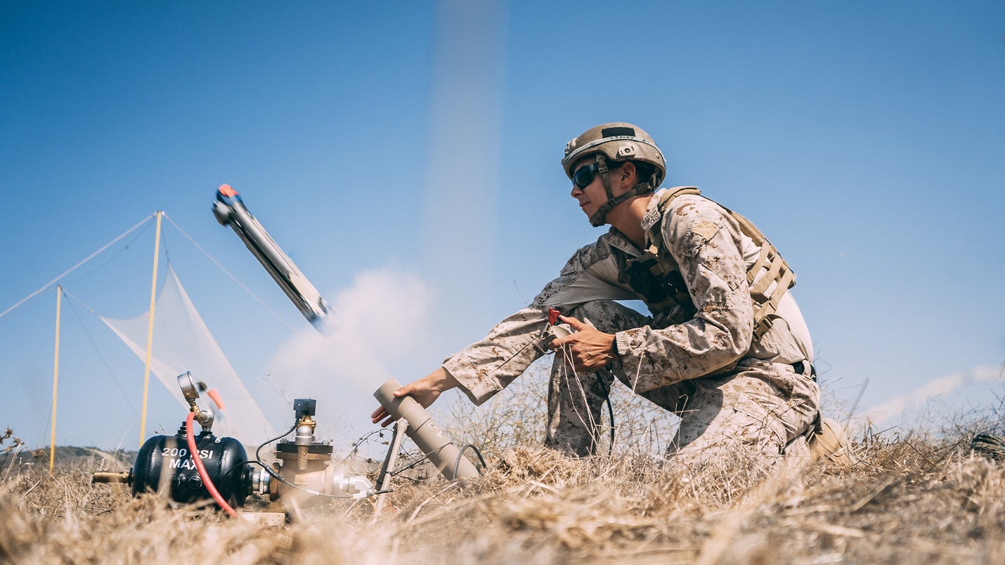 U.S. Marine Corps Cpl. Jonathan Altamirano, a fire support Marine with 1st Air Naval Gunfire Liaison Company (ANGLICO), I Marine Expeditionary Force Information Group, launches a lethal miniature aerial missile system during an exercise at Marine Corps Base Camp Pendleton, California, Sept. 2, 2020. The Switchblade is supposed to be similar is capability to the new Phoenix Ghost drones being sent to Ukraine. (U.S. Marine Corps Photo by Cpl. Jennessa Davey)