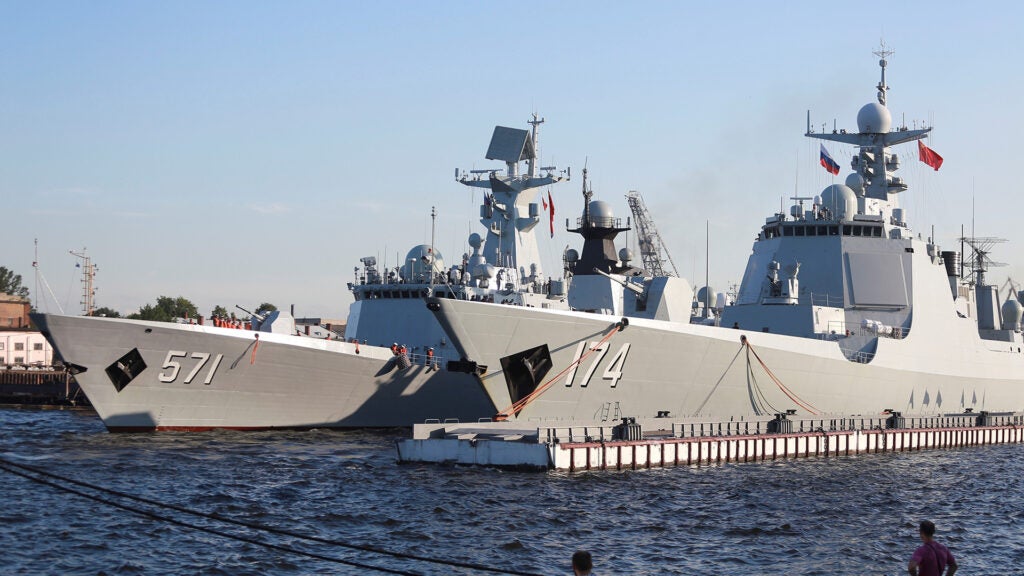 SAINT-PETERSBURG, RUSSIA - JULY 27: China's frigate Yuncheng (L) and missile destroyer Hefei (R) arrives at St Petersburg to take part in a ship parade marking Russian Navy Day in St. Petersburg, Russia, 27 July 2017. (Photo by Sergey Mihailicenko/Anadolu Agency/Getty Images)