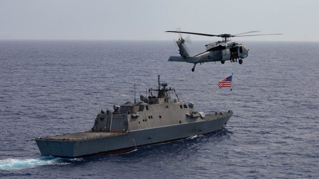  The Freedom-variant littoral combat ship USS Wichita (LCS 13) and its embarked aviation detachment participates in a maritime training exercise with the Freedom-variant littoral combat ships USS Sioux City (LCS 11), and USS Billings (LCS 15), July 4, 2021.  (U.S. Navy photo by Mass Communication Specialist 2nd Class Marianne Guemo/Released)