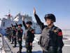 ZHOUSHAN, April 28, 2020 -- Special operation soldiers of the Chinese naval fleet for escort mission wave farewell on the deck at a port in Zhoushan, east China's Zhejiang Province, April 28, 2020.
  The 35th fleet of the Chinese People's Liberation Army (PLA) Navy on Tuesday left the port city of Zhoushan in east China's Zhejiang Province for the Gulf of Aden and waters off Somalia to escort civilian ships. 
   Composed of the guided-missile destroyer Taiyuan, the missile frigate Jingzhou and the supply ship Chaohu, the fleet has more than 690 officers and soldiers, dozens of special operation soldiers and two helicopters on board. (Photo by Jiang Shan/Xinhua via Getty) (Xinhua/Jiang Shan via Getty Images)