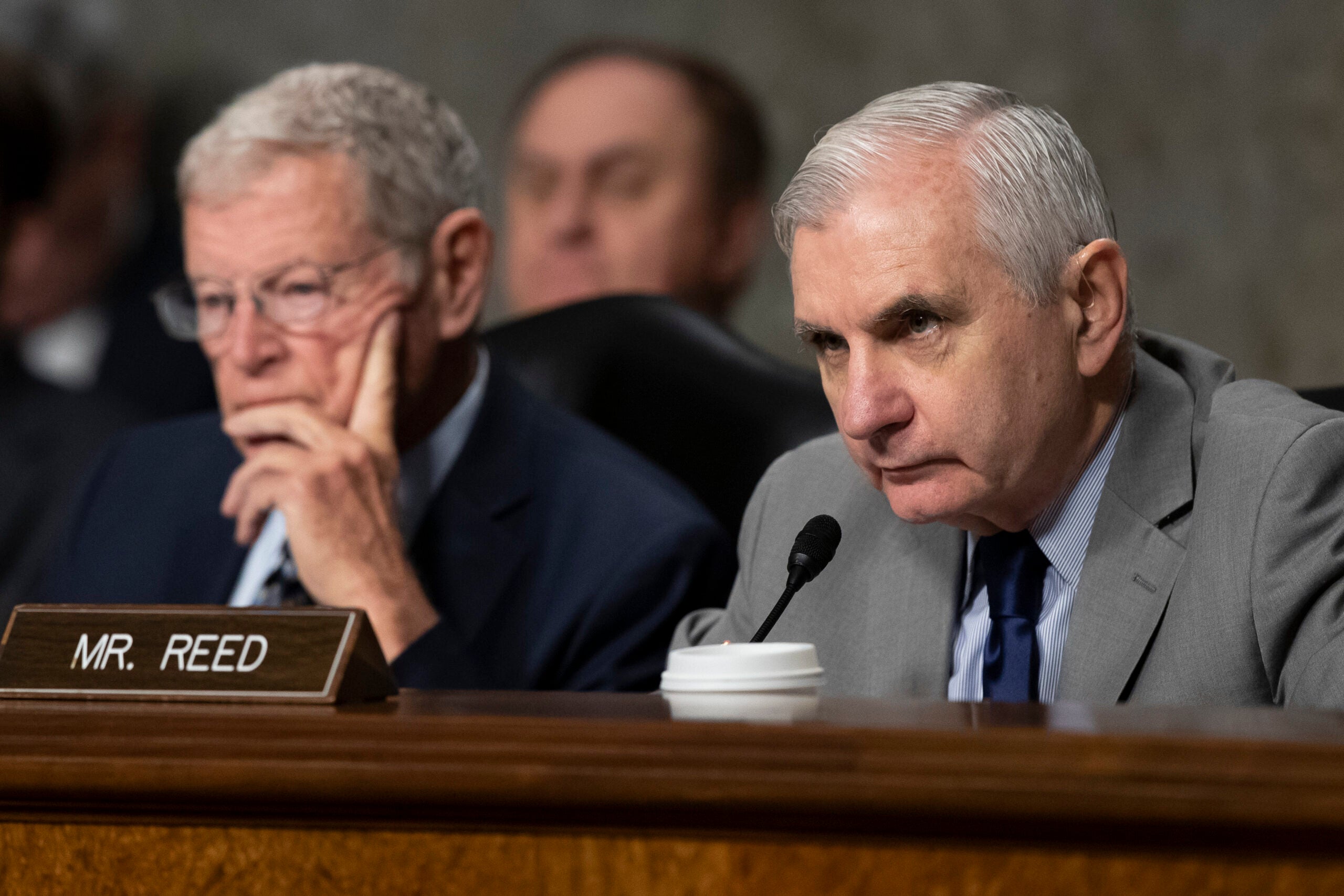 Senate Armed Services Committee Chairman Jim Inhofe, of Oklahoma, listens as Ranking Member Sen. Jack Reed, D-R.I., speaks during a hearing of the Senate Armed Services Committee about about ongoing reports of substandard housing conditions Tuesday, Dec. 3, 2019 in Washington, on Capitol Hill. (AP Photo/Alex Brandon)