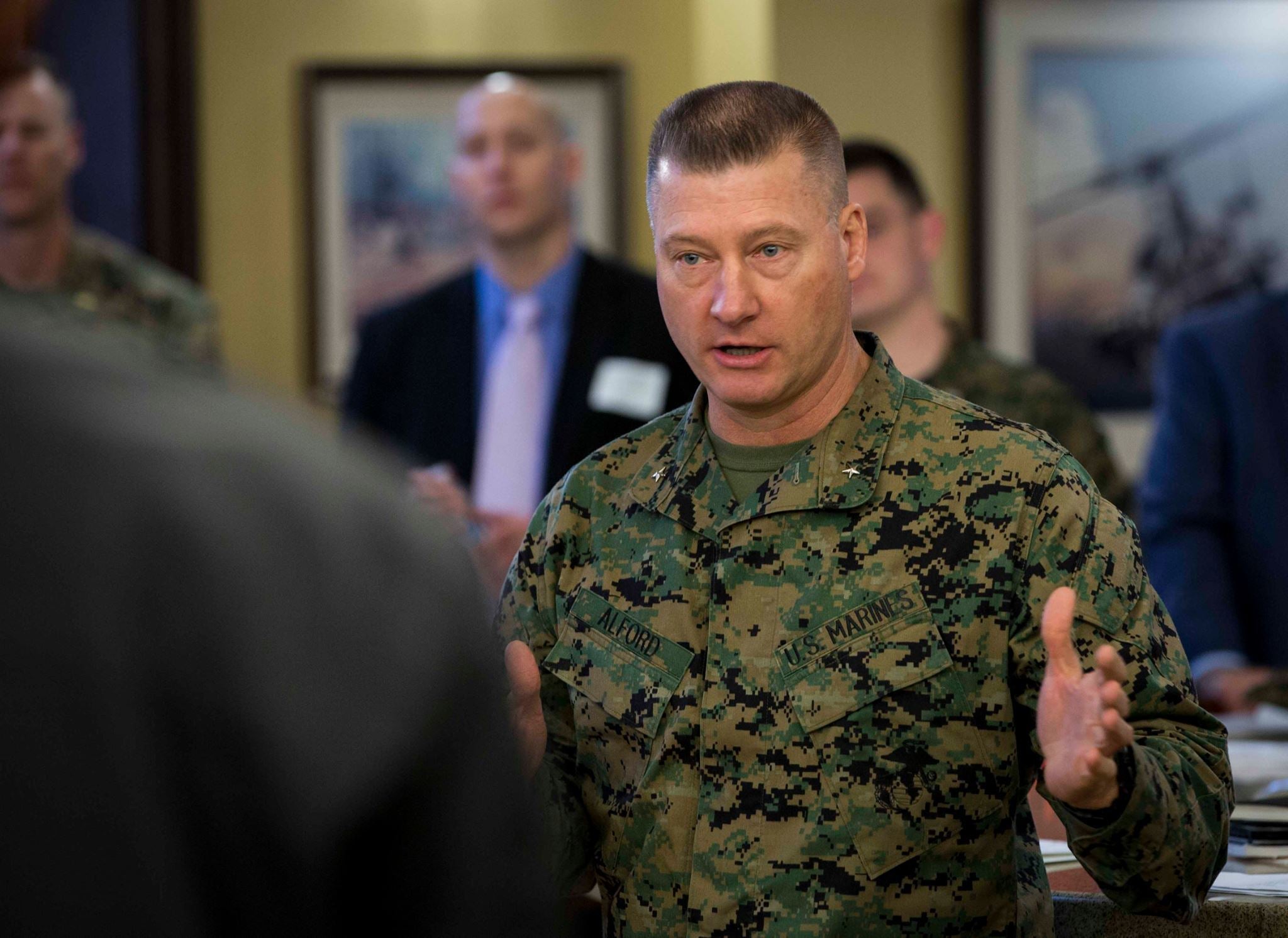 Brig. Gen. J.D. Alford, Commanding General, Marine Corps Warfighting Laboratory/Futures Directorate, talks with Science Fiction Writer's Workshop participants Feb. 4. (Photo by Kyle Olson, Marine Corps Warfighting Laboratory)