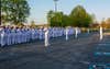 U.S. Navy Sailors take part in a uniform inspection at Naval Health Clinic Quantico, Quantico, Virginia, April 22, 2022. The sailors were undergoing a Summer Whites Uniform Inspection and attended an award ceremony.  (US Marine Corps photo by Lance Cpl. Kayla LaMar)