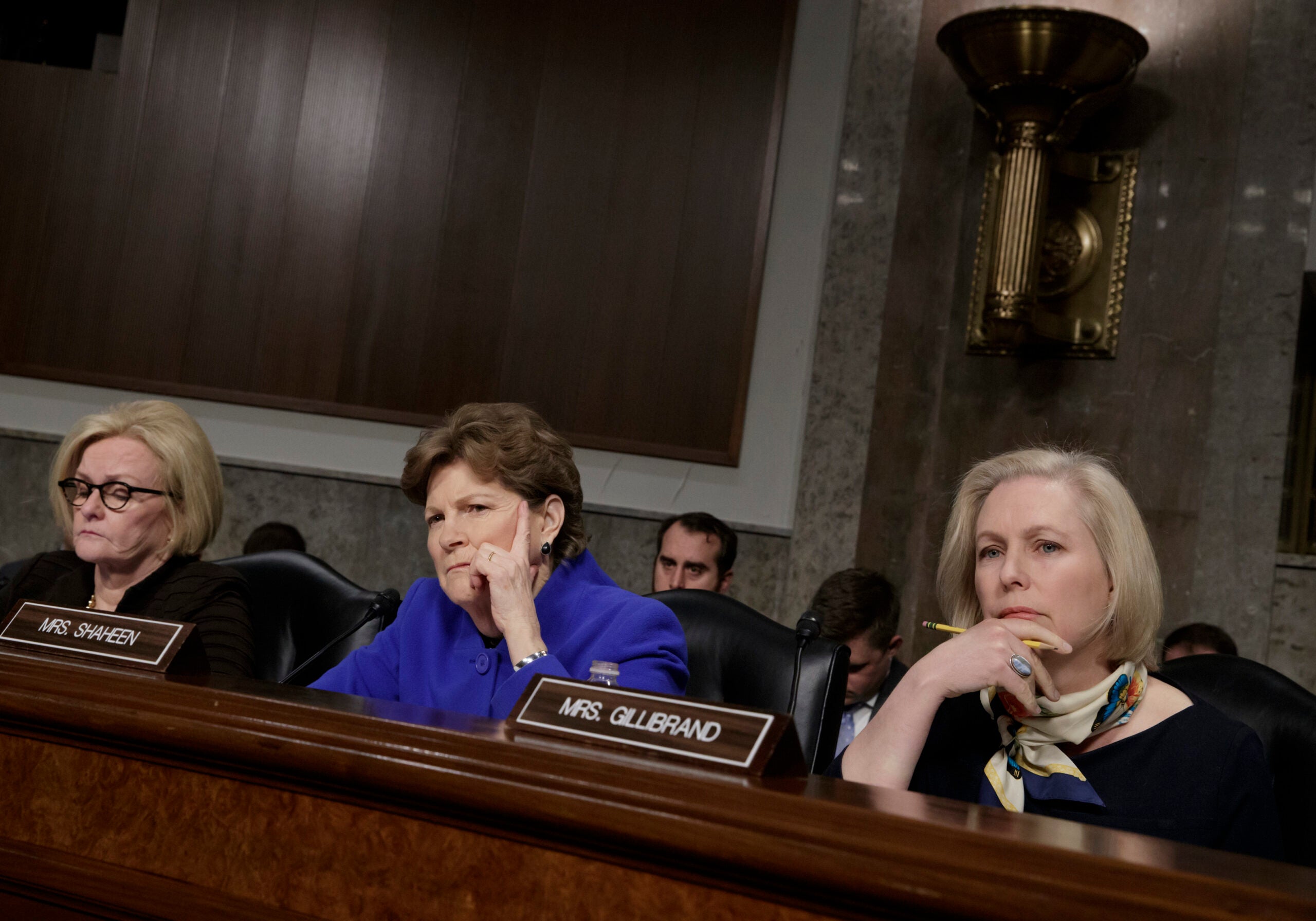 Sen. Kirsten Gillibrand, D-N.Y.,right, joined at left by Sen. Jeanne Shaheen, D-N.H., and Sen. Claire McCaskill, D-Mo., far left, questions Marine Gen. Robert B. Neller, the commandant of the Marine Corps, at a Senate Armed Services Committee hearing on the investigation of nude photographs of female Marines and other women that were shared on the Facebook page "Marines United," on Capitol Hill in Washington, Tuesday, March, 14, 2017. (AP Photo/J. Scott Applewhite)