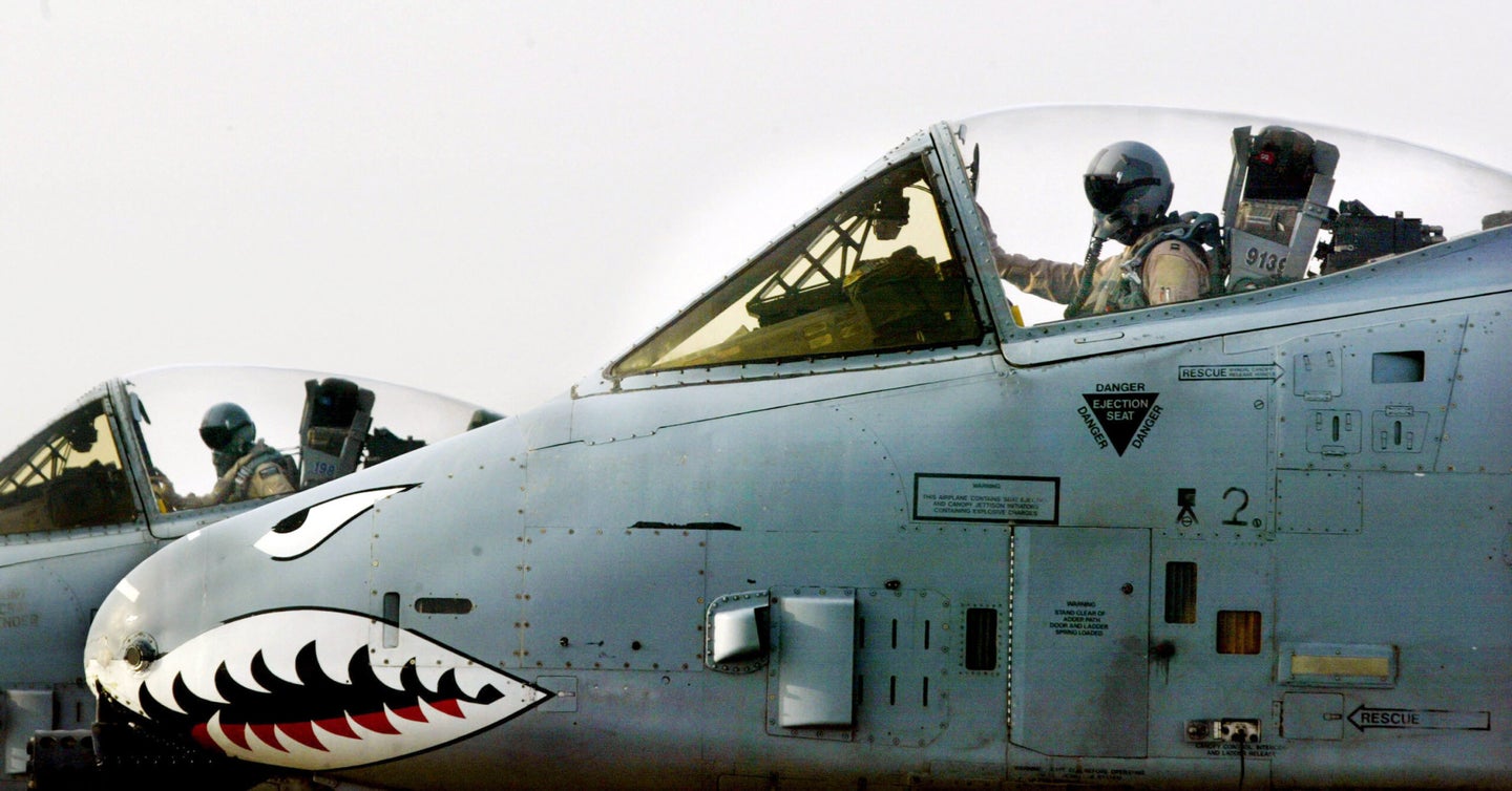 U.S. A-10 Warthog pilots go through their pre-flight checks in the cockpit before takeoff on the flight line at an air base in the Arabian Gulf near the Iraqi border on March 17, 2003.  (Paula Bronstein/Getty Images)