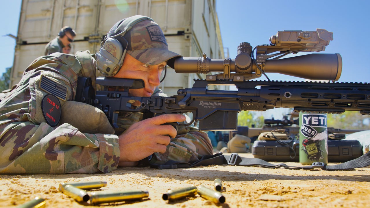 U.S. Army Staff Sgt Tristin Ivkov, A Army Sniper assigned to Headquaters, Headquarters Company, 1st Battlaion, 157th Infantry Regiment, Colorado National Guard, zeros his M2010 Sniper Rifle before the start of the International Sniper Competition. (Staff Sgt Austin Berner/U.S. Army Reserve)