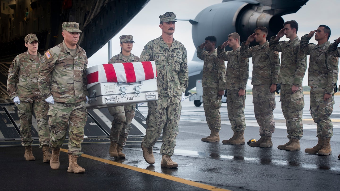 U.S. service members assigned to the Defense POW/MIA Accounting Agency (DPAA), participate in an honorable carry ceremony held on Joint Base Pearl Harbor-Hickam, Hawaii, May 19, 2022. DPAA received the possible remains of a U.S. Airman from a World War II aircraft crash following a repatriation ceremony in Thailand. (Sgt. Morgan L. R. Burgess/U.S. Marine Corps)