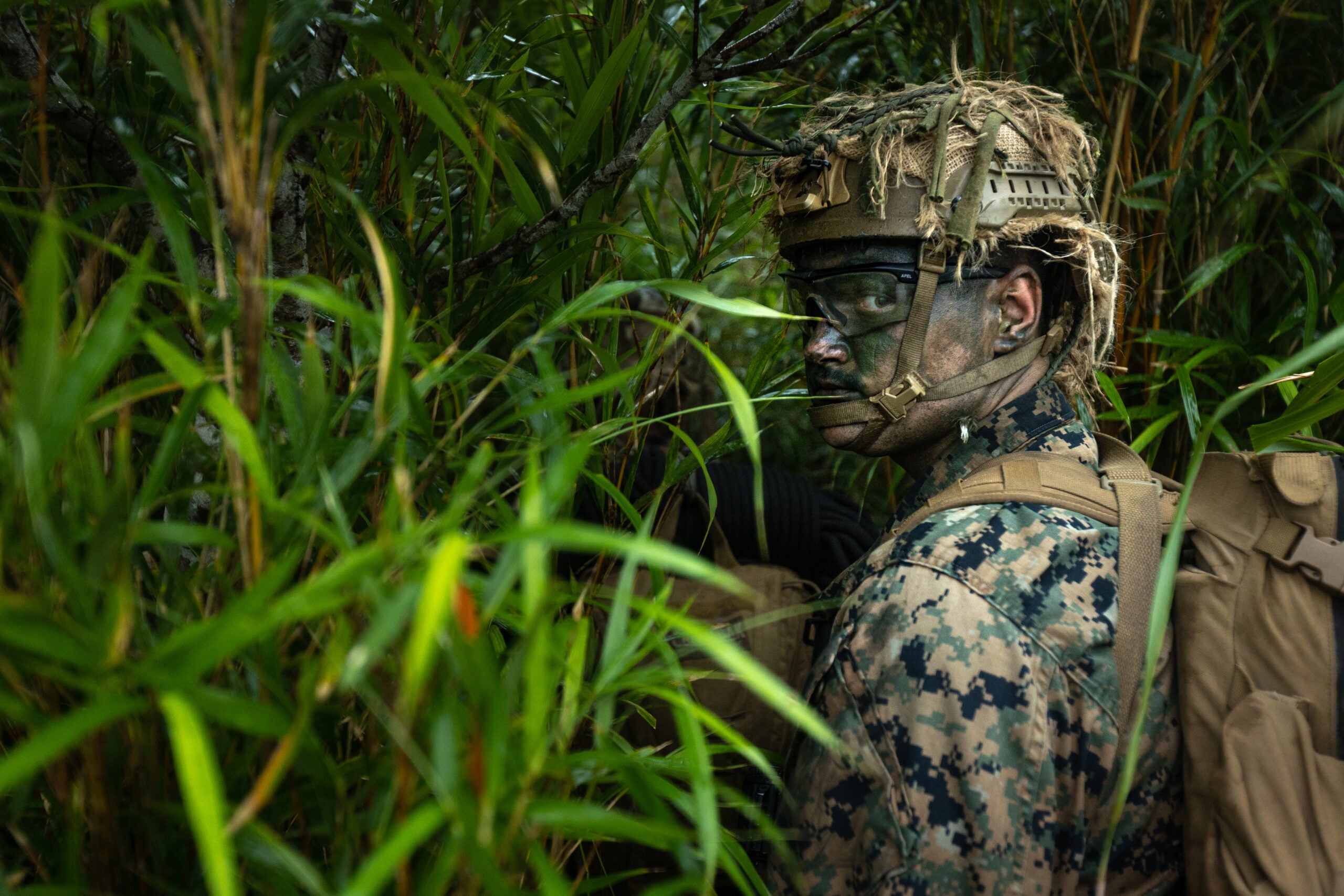 U.S. Marine Corps Lance Cpl. Austin White, a rifleman with 3d Battalion, 2d Marines, patrols during Counter Assault Exercise on Okinawa, Japan, May 11, 2022. During this force-on-force exercise, an infantry company with 3/2 rapidly deployed into the double-canopy jungles of the Northern Training Area to defend against an assault from another infantry company with 1st Battalion, 3d Marines. This exercise was designed to increase 3d Marine Division’s ability to seize and defend key maritime terrain, such as islands or coastal areas, and conduct Expeditionary Advanced Base Operations in the western Pacific. 3/2 is deployed under 4th Marines, 3d Marine Division as part of the Unit Deployment Program. (U.S. Marine Corps photo by Sgt. Micha Pierce)