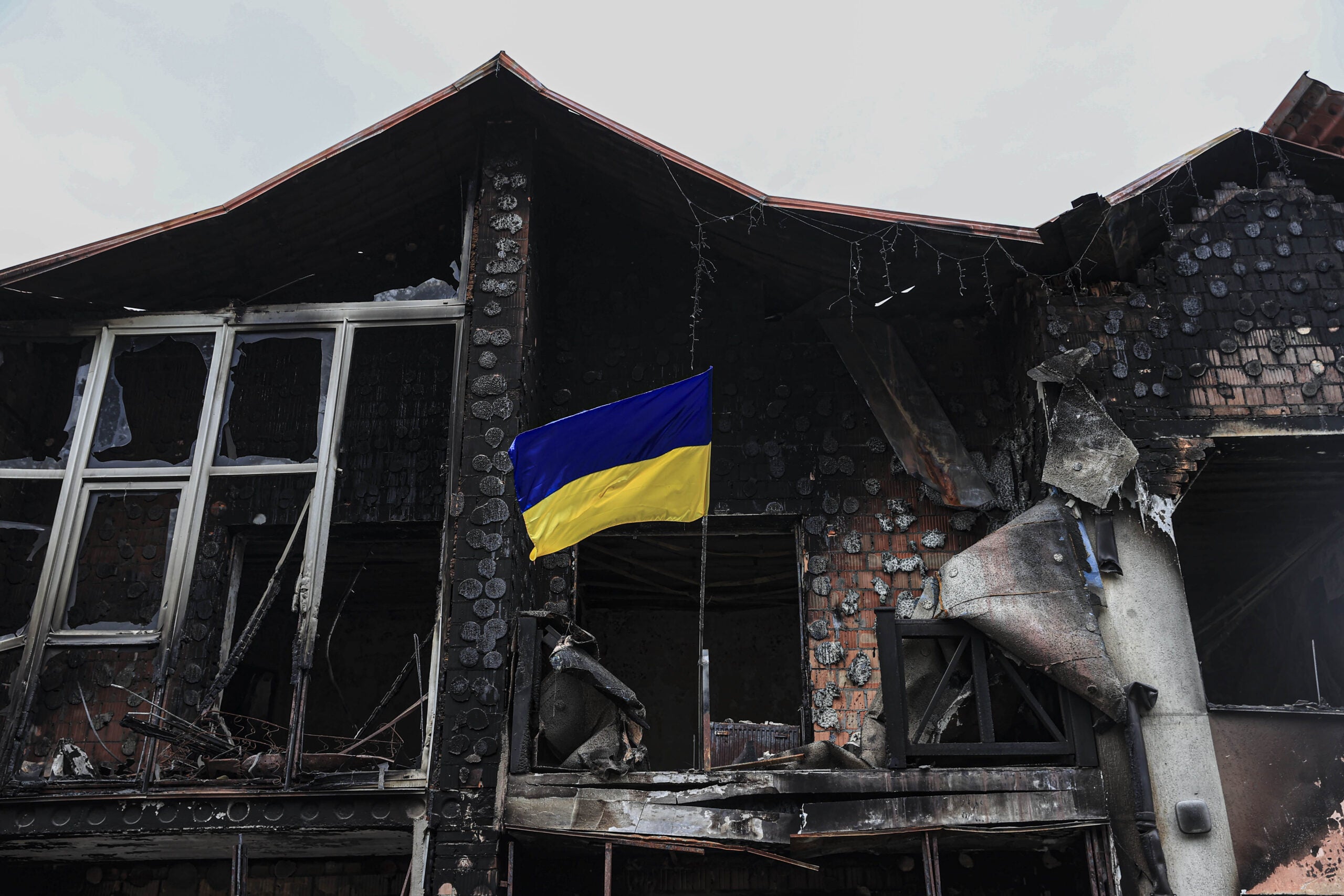 IRPIN, UKRAINE - JUNE 21: A view of devastation after conflicts as Ukrainians trying to rebound back to life Irpin near Kyiv, Ukraine on June 21, 2022. The city was one of the main hotspots of fighting with Russian troops before Ukrainian forces pulled back. (Photo by Metin Aktas/Anadolu Agency via Getty Images)