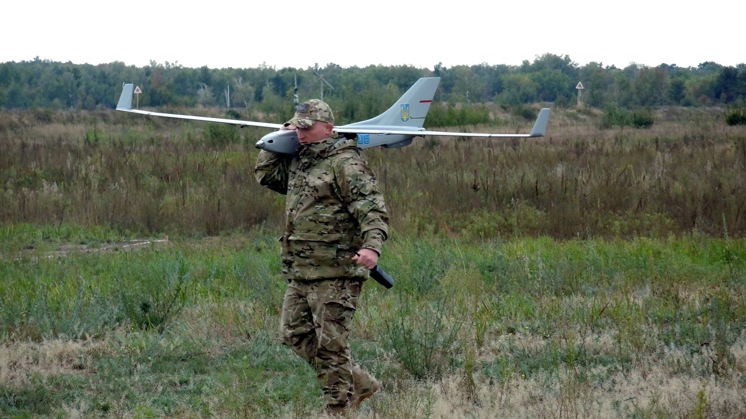 A contestant carries an unmanned aerial vehicle (UAV) during a competition for the best drone crew title for security forces, Cherkasy, central Ukraine, September 25, 2018. Ukrinform. (Photo credit should read Yulii Zozulia/Future Publishing via Getty Images)