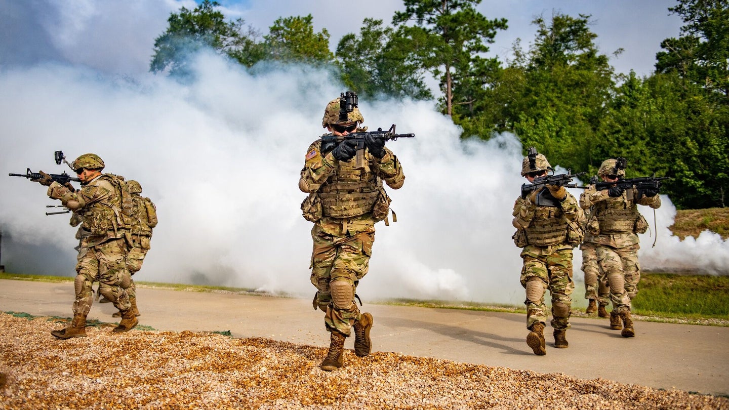 Soldiers from 1st Battalion, 50th Infantry Regiment, 198th Infantry Brigade, maneuver as an Infantry Rifle Squad Aug. 21, 2020, on Sand Hill.  (Patrick A. Albright/U.S. Army)