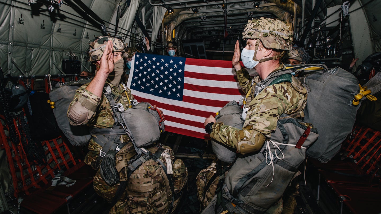 Staff Sgt. O'Connor, a U.S. Army paratrooper assigned to 2nd Battalion, 503rd Infantry Regiment, 173rd Airborne Brigade re-enlists for another contract in the U.S. Army while performing jumpmaster duties during an airborne operation in Aviano Air Base, Italy, June 24, 2020. (Spc. Ryan Lucas/U.S. Army)