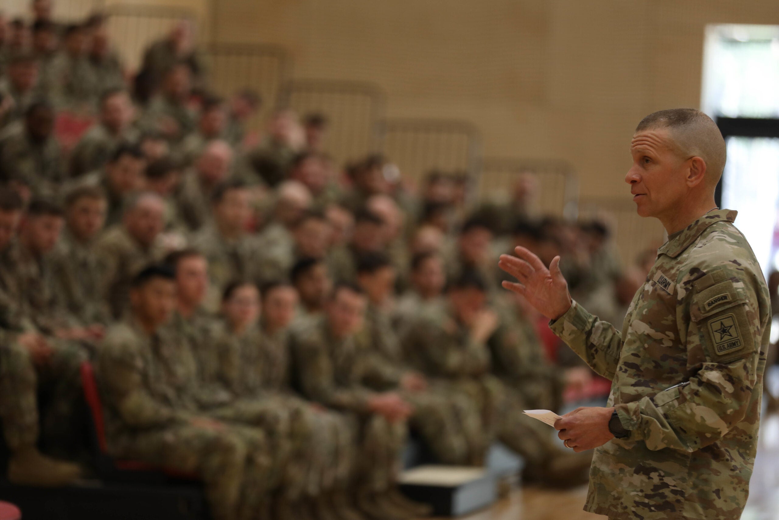 Sgt. Maj. of the Army Michael A. Grinston talks to the Soldiers of the 1st Infantry Division Artillery during a town hall held at Forward Operation Site Adazi, Latvia, May 2, 2022. (Sgt. Eliezer Meléndez/U.S. Army National Guard)