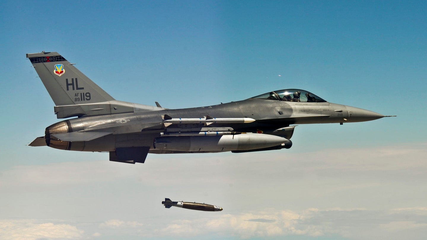 An F-16 Fighting Falcon from Hill Air Force Base, Utah, releases a bomb. The button military pilots push to release ordnance is called the "pickle." (U.S. Air Force)