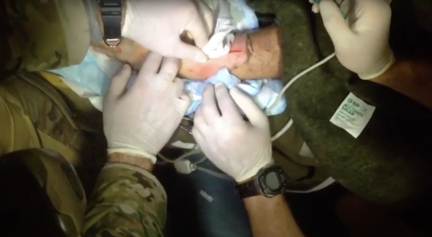 Air Force pararescuemen treat a patient aboard the Tamar during a rescue mission in April 2017. (Screenshot via YouTube / 106th Rescue Wing)