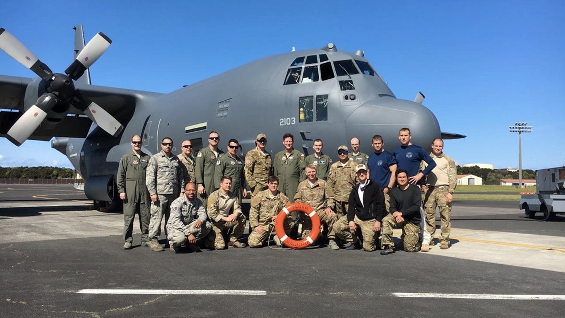 Members of the New York Air National Guard’s 106th Rescue Wing who worked together to save two badly burned sailors on board the 625-foot long bulk cargo carrier Tamar pose for a picture in front of their HC-130 search and rescue aircraft at Lajes Field in the Azores on April 28, 2017. (U.S. Air Force courtesy photo)