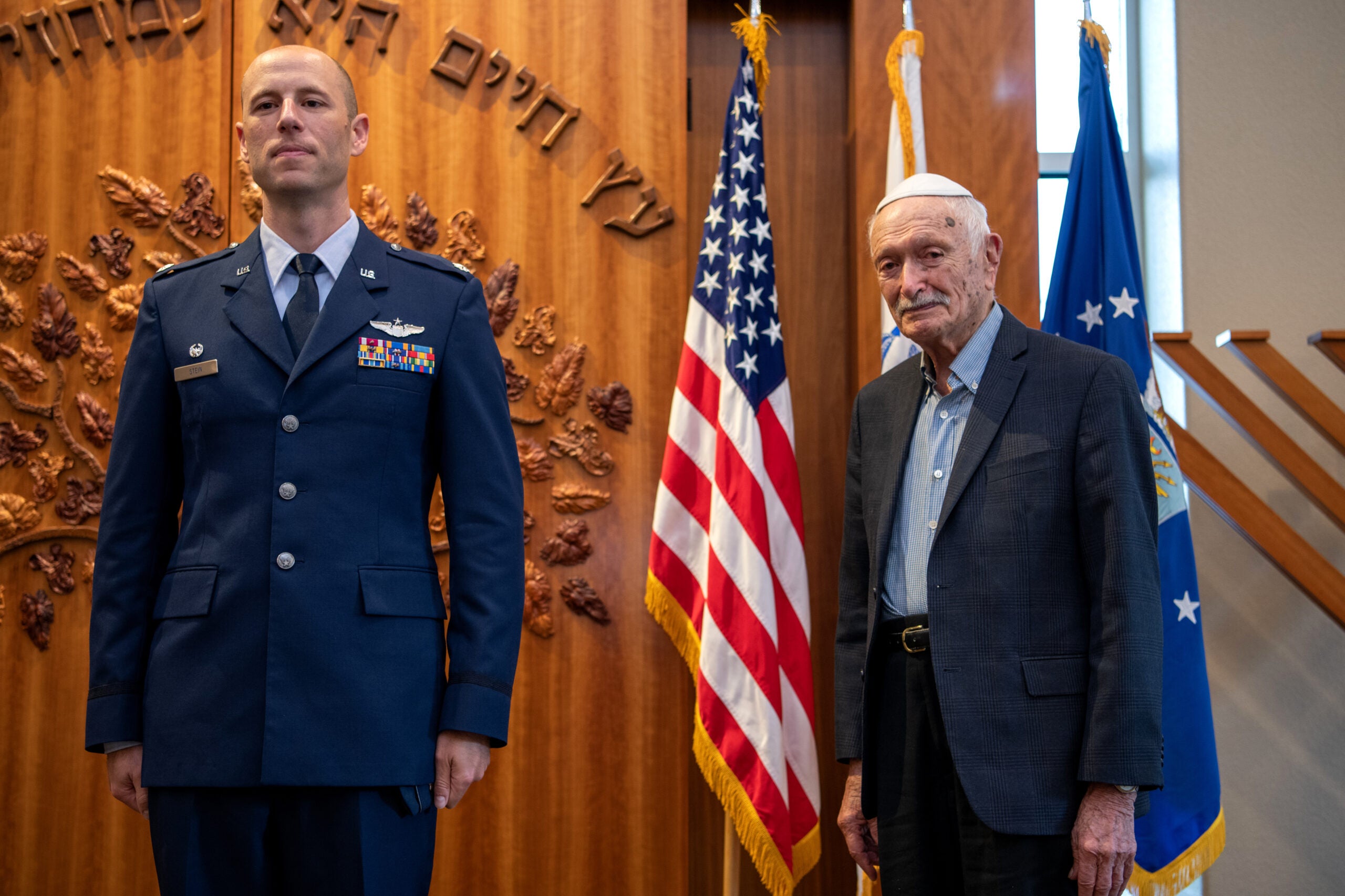 U.S. Air Force Lt. Col. Stein (left), 502nd Operations Support Squadron commander, prepares to present U.S. Army Air Corps 1st Lt. Gerald Teldon, retired, with the Air Medal for his honorable service as a pilot on July 29, 2022, at the Chabad Center for Jewish Life and Learning, San Antonio, Texas. Teldon, born in Bronx, N.Y., in 1924, joined the military in 1944. He completed 62 missions during WWII and the Korean War. Lt. Col. Andrew Stein, 502nd Operations Support Squadron commander, was the presiding officers. The awards presented to Teldon are as follows: the Air Medal; American Campaign Medal; European – African – Middle Eastern Campaign Medal; World War II Victory Medal; National Defense Medal; and the Distinguished Unit Citation. (U.S. Air Force photo by Sarayuth Pinthong)