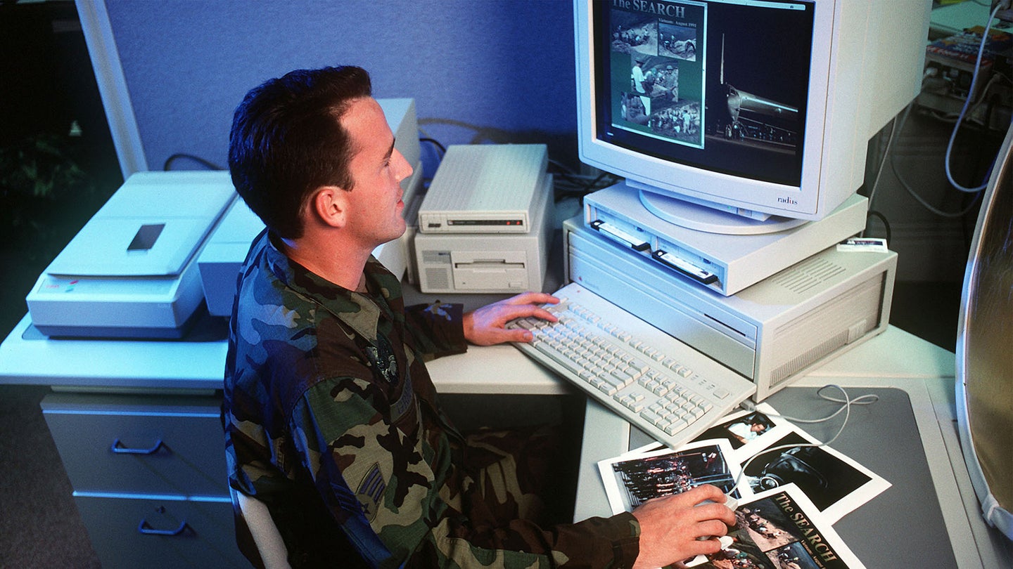In this 1998 USAF file photo, an airman uses a computer that was probably as slow as the ones in use today.  (Getty Images)