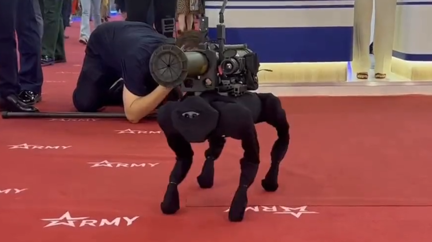 The M-81 robotic dog with a RPG-26 mounted to it on display in Moscow. (Screenshot via Twitter/RIA Novosti)