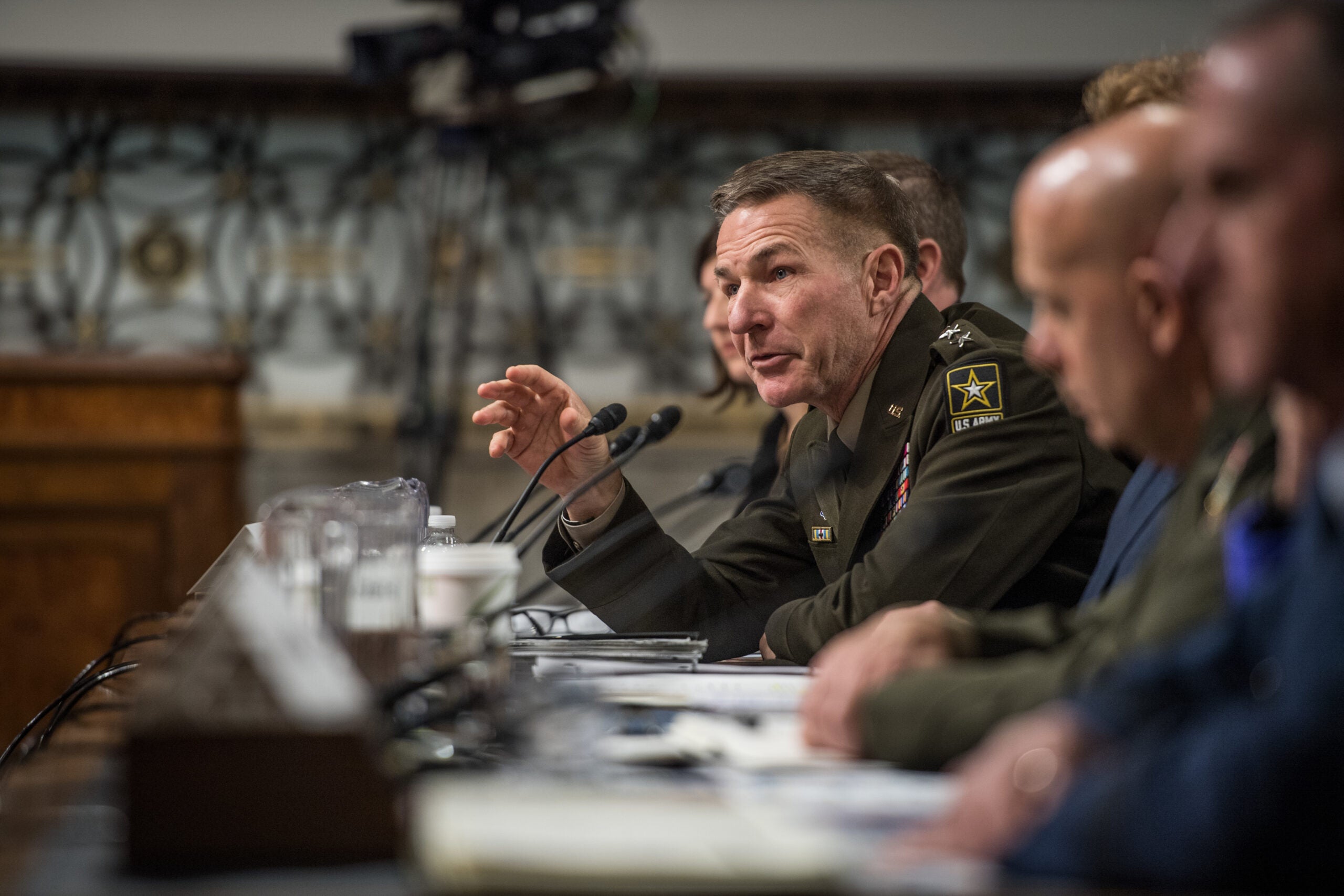 Gen. James C. McConville, along with other service Secretaries and Chiefs, speaks to the Senate Committee on Armed Services during a hearing on privatized housing in Washington D.C., Dec. 3, 2019. (U.S. Army photo by Sgt. Dana Clarke)