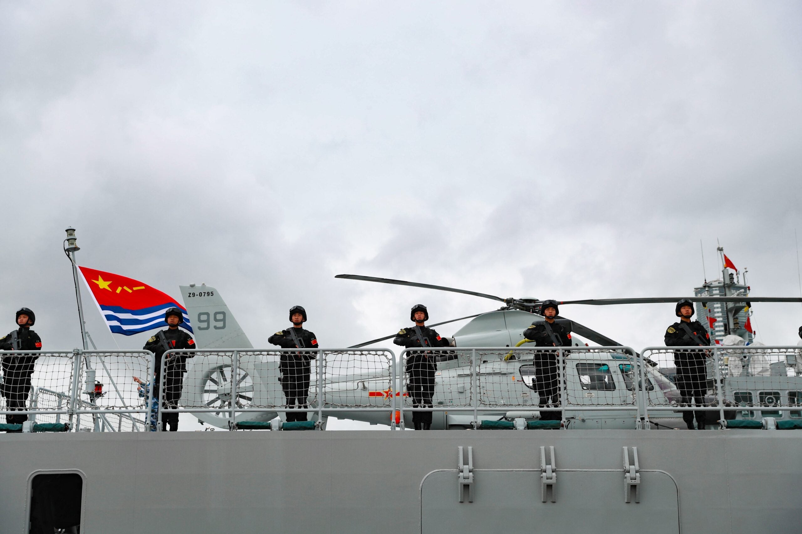 The 39th fleet of the Chinese People's Liberation Army PLA Navy sets out to conduct an escort mission in the Gulf of Aden and the waters off Somalia, at a port in Qingdao, east China's Shandong Province, Sept. 26, 2021. The fleet is composed of the guided-missile destroyer Urumqi, the missile frigate Yantai, and the supply ship Taihu, with dozens of special-operations soldiers and two helicopters on board.The PLA Navy began conducting escort missions in the Gulf of Aden and the waters off Somalia in December 2008. (Photo by Liu Zaiyao/Xinhua via Getty Images)