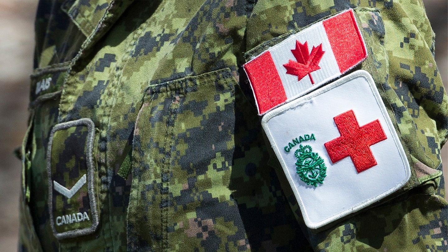 Patches worn by a member of Canadian Forces personnel, tasked to Eatonville Care Centre on The East Mall, as she heads to a transport bus following the day at the nursing home. (Rick Madonik/Toronto Star via Getty Images)