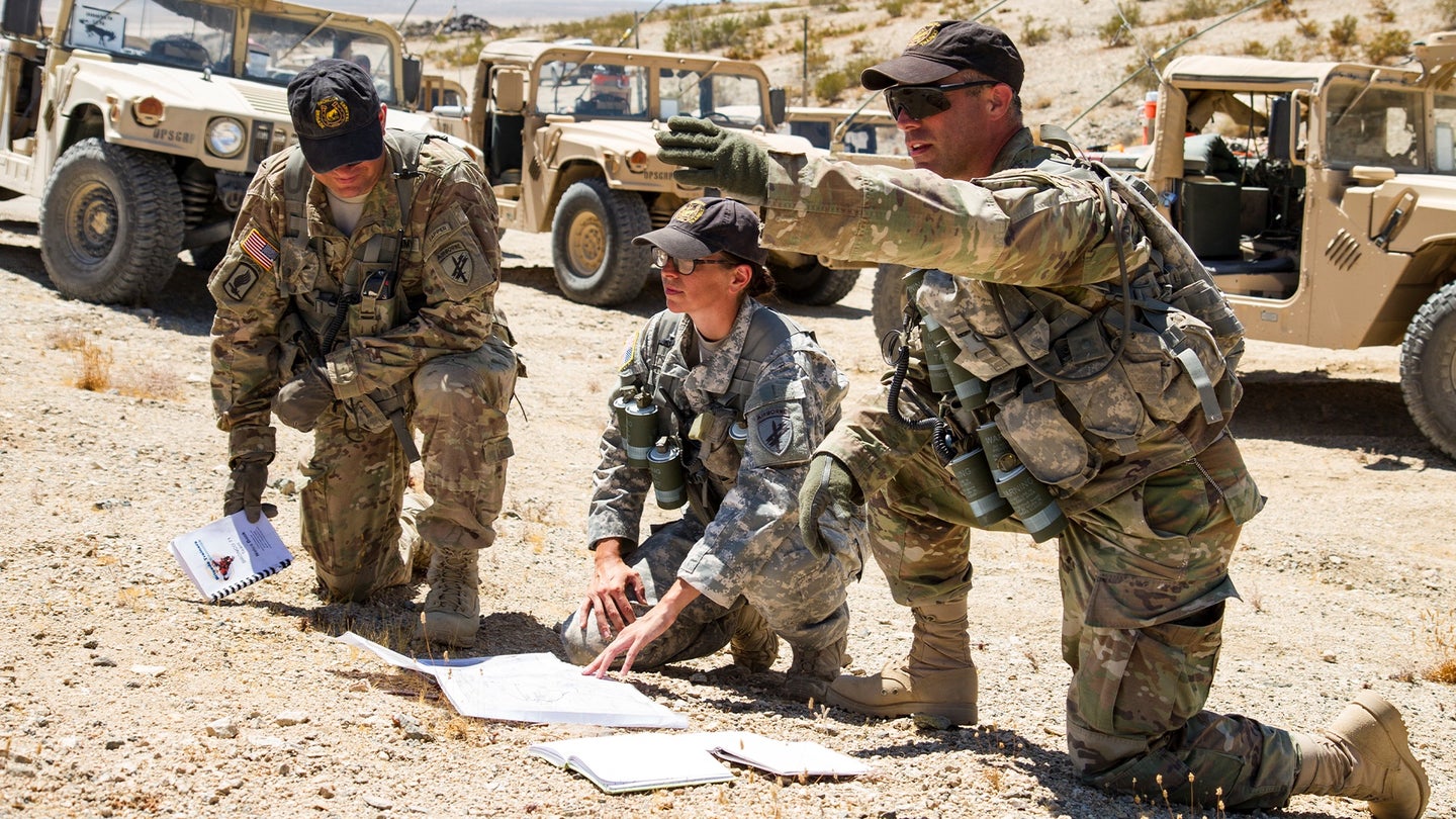 Observer coach trainers from the Bronco team at the national training center, Ft. Irwin, Calif., prepare, advise, counsel, and train rotational Soldiers Aug. 21, 2017. (Spc. Sarah K. Anwar/U.S. Army)