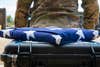 A U.S. flag rests over recovered remains during a dignified transfer ceremony at Joint Base Pearl Harbor-Hickam, Hawaii, July 1, 2022. The Defense POW/MIA Accounting Agency (DPAA) received both the recovered remains and material evidence from a past conflict in Socialist Republic of Vietnam. DPAA’s mission is to achieve the fullest possible accounting for missing and unaccounted-for U.S. personnel to their families and our nation. (U.S. Air Force photo by Staff Sgt. Blake Gonzales)