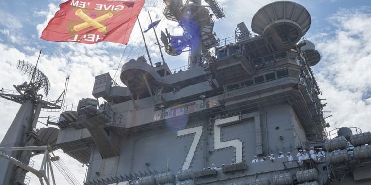 ‘Give ‘em hell!’ — Why a Navy aircraft carrier sports an Army-inspired battle flag