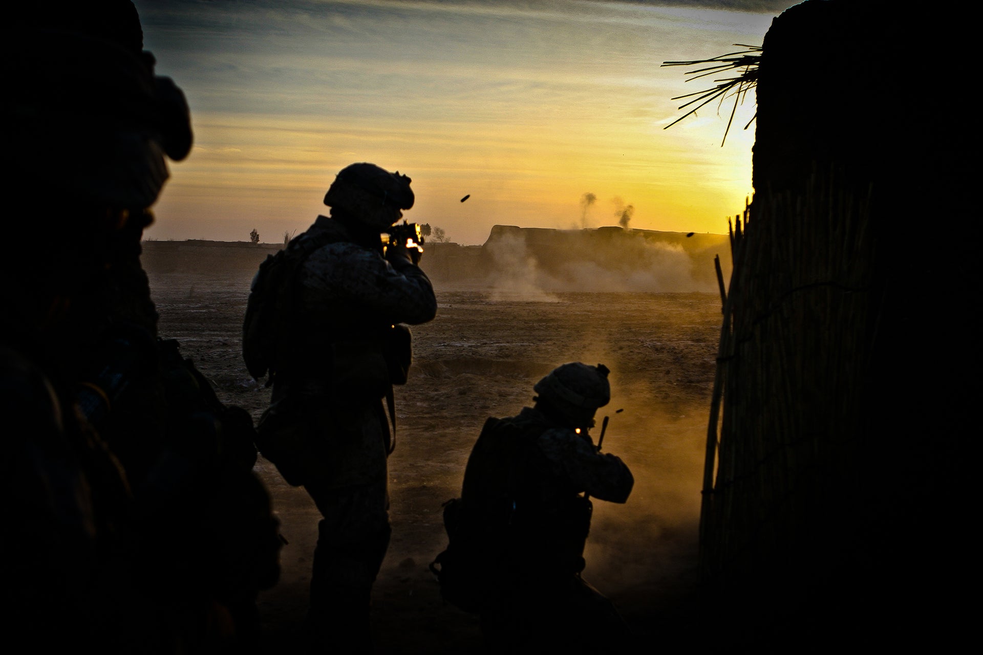 Marines with Alpha Company, 1st Battalion, 6th Marine Regiment return fire during a gunfight in Helmand province, Afghanistan in January 2010 while then-Sgt. Bill Bee was leading the patrol. (Cpl. James Clark/U.S. Marine Corps)