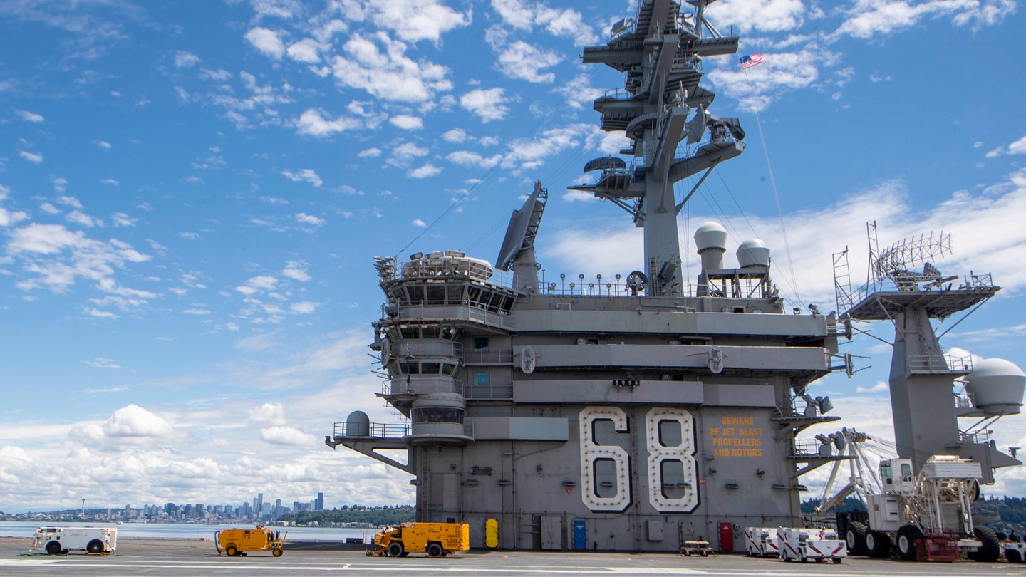 The aircraft carrier USS Nimitz (CVN 68) transits Puget Sound in July. (Mass Communication Specialist 2nd Class Jared Mancuso/U.S. Navy)