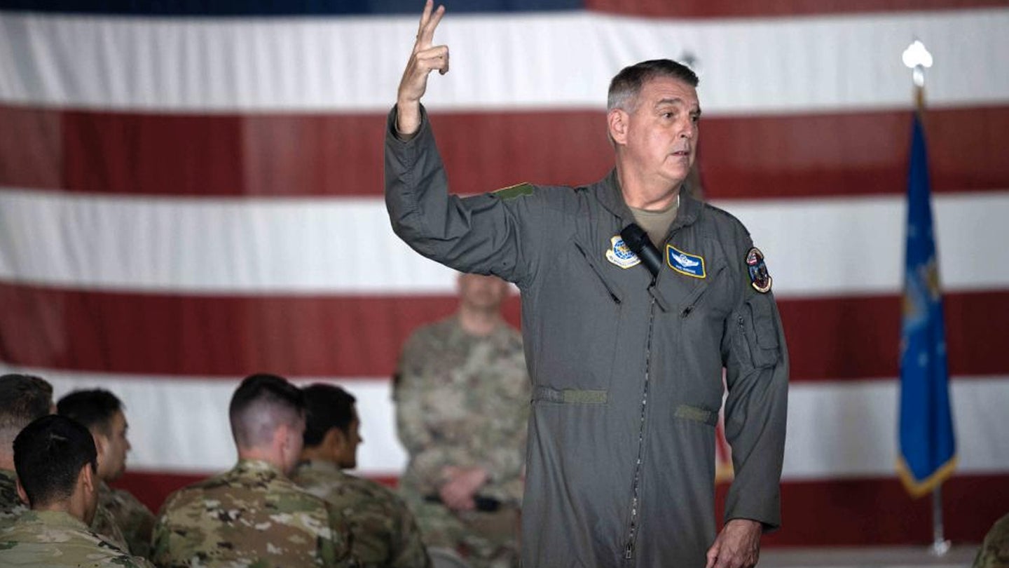 Gen. Mike Minihan, Air Mobility Command commander, speaks to Team Dover Airmen during an all call at Dover AFB, Delaware, May 5, 2022. (Senior Airman Faith Schaefer/U.S. Air Force)