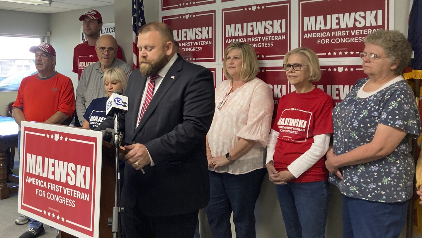 Ohio Republican congressional candidate J.R. Mejewski defends his military record at a news conference Friday, Sept. 23, 2022, in Holland, Ohio. (AP Photo/John Seewer)