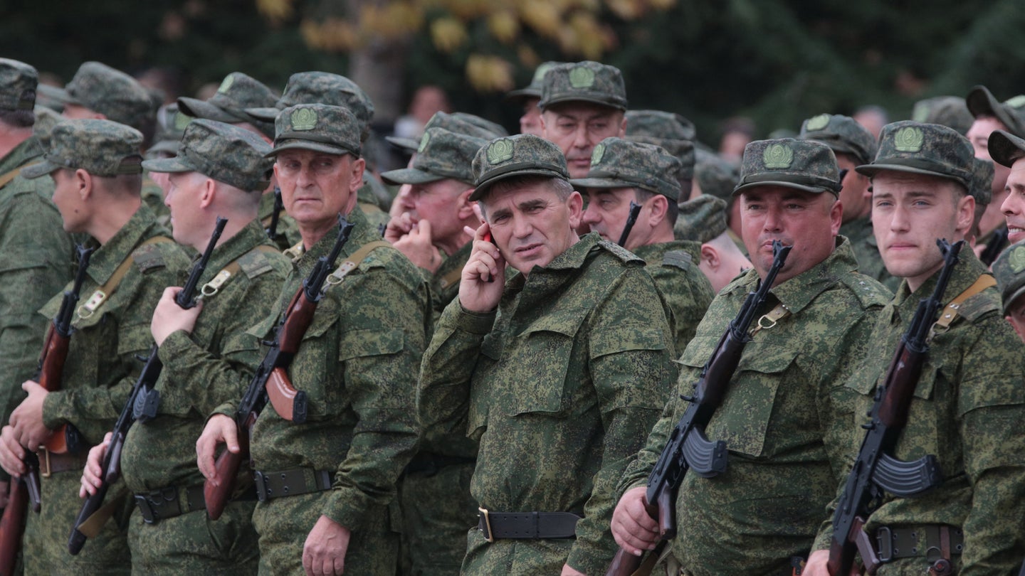 Reservists drafted during the partial mobilisation attend a departure ceremony in Sevastopol, Crimea, on September 27, 2022. (Photo by STRINGER/AFP via Getty Images)