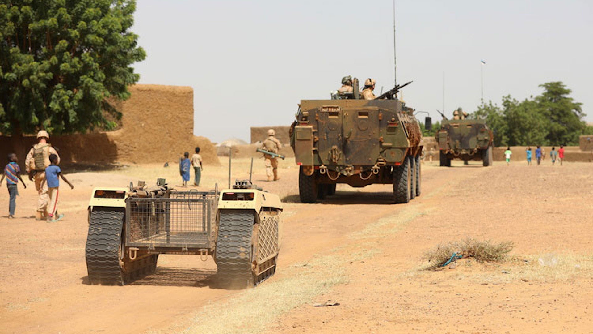 A THeMIS UGV following an infantry patrol in Mali. 