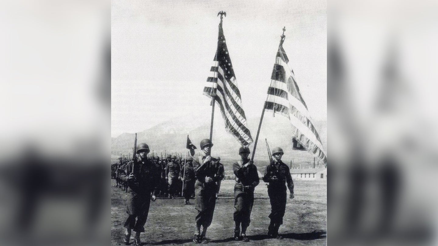 Soldiers in the 122nd Infantry Battalion display both the U.S. and Greek flags. (U.S. Army photo)
