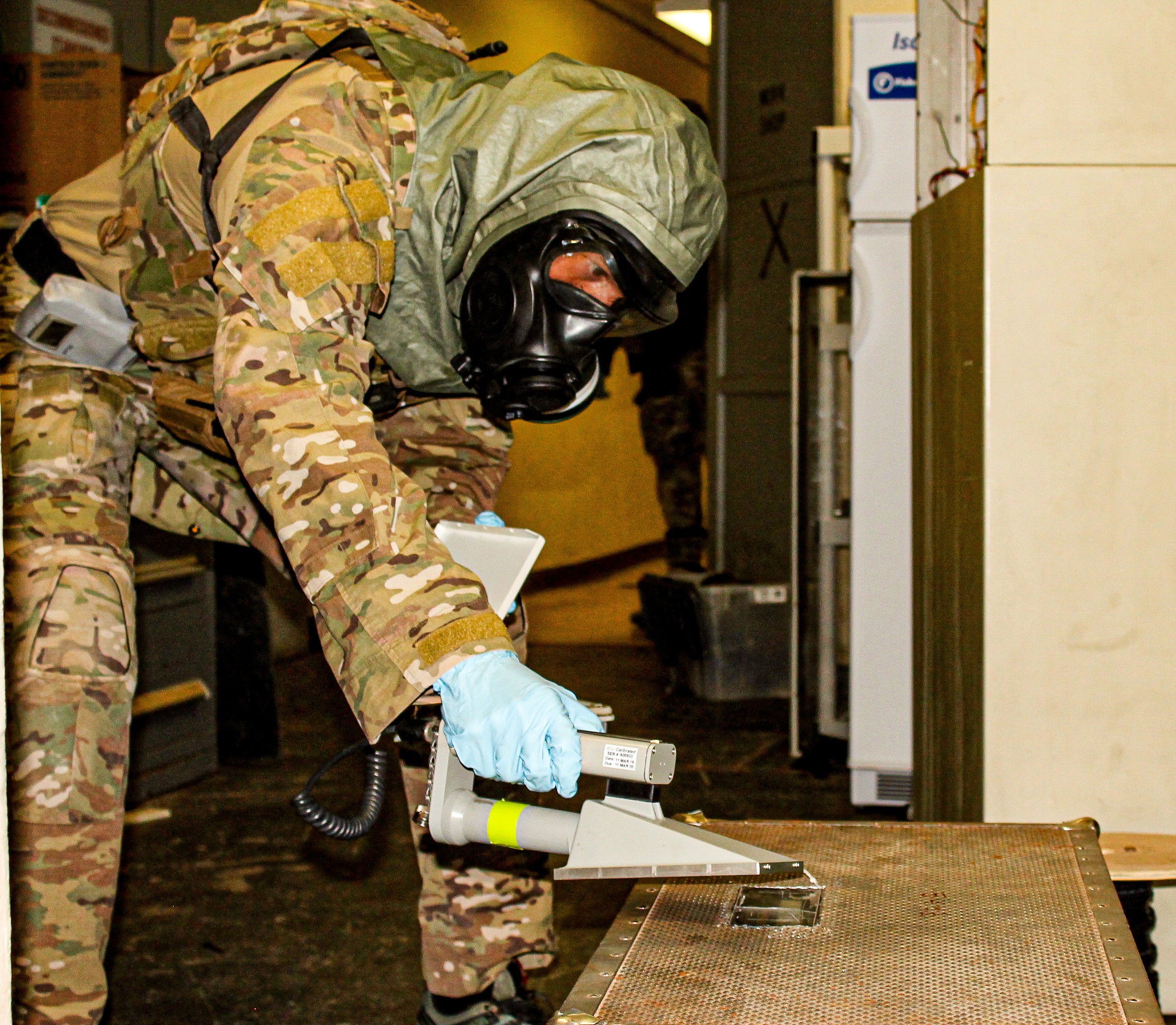 200604-N-UP025-001 San Diego, Calif. (June 4, 2020) An explosive ordnance disposal (EOD) technician assigned to EOD Mobile Unit Eleven conducts radiological search procedures at a training bunker onboard Naval Base Point Loma as part of training administered through EOD Training and Evaluation Unit One. Navy EOD technicians are uniquely qualified to detect, identify, exploit, and eliminate chemical, biological, radiological, nuclear and explosive weapons in support of conventional and special operations forces. (U.S. Navy photo by Lt. Kara Handley/released)