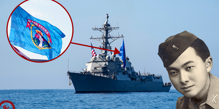 We salute the USS Daniel Inouye for flying its badass battle flag on the way into port