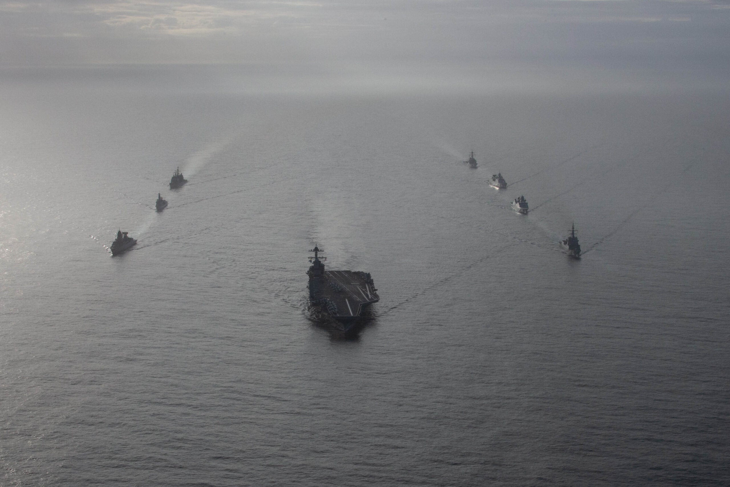The first-in-class aircraft carrier USS Gerald R. Ford steams in formation with Spanish Armada frigate Álvaro de Bazán , Danish frigate HDMS Peter Willemoes, Dutch frigate HNLMS De Zeven Provincien, Arleigh Burke-class guided-missile destroyer USS Ramage, German frigate FGS Hessen, Dutch frigate HNLMS Van Amstel, and Ticonderoga-class guided-missile cruiser USS Normandy, Oct. 25, 2022. 