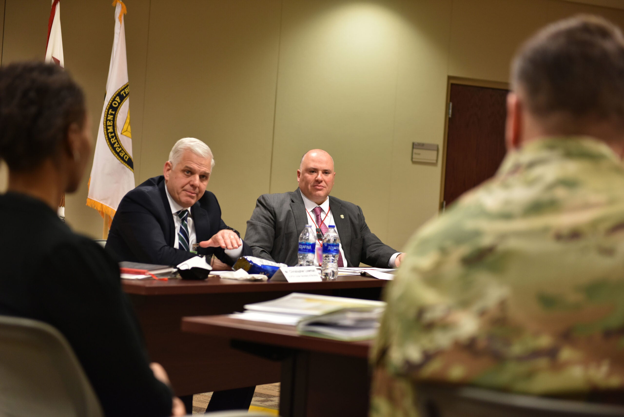 The Hon. Christopher Lowman, left, speaks to CID senior leadership during a visit to the CID Headquarters at Marine Corps Base Quantico, Virginia, Jan. 25, 2022.