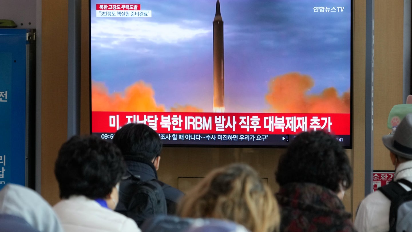 A TV screen shows a file image of North Korea's missile launch during a news program at the Seoul Railway Station in Seoul, South Korea, Friday, Nov. 4, 2022. (AP Photo/Ahn Young-joon)