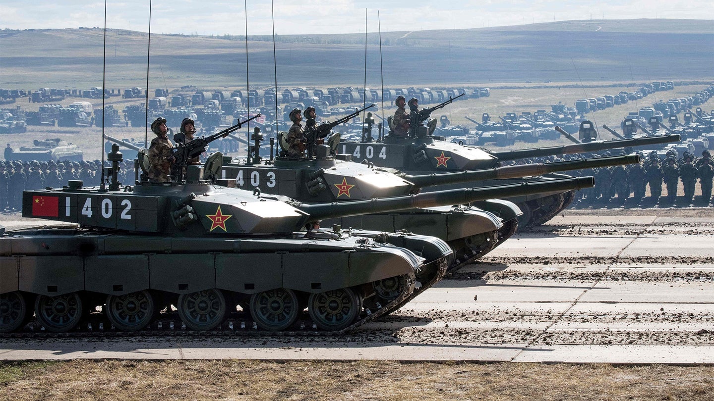 Chinese tanks parade at the end of the day of the Vostok-2018 (East-2018) military drills at Tsugol training ground not far from the borders with China and Mongolia in Siberia, on September 13, 2018. (MLADEN ANTONOV/AFP via Getty Images)