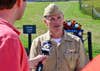 210909-N-RB168-0265 STOYSTOWN, Pa. (Sept. 9, 2021) - Capt. J. W. David Kurtz, commanding officer of amphibious transport dock ship USS Somerset (LPD 25), answers questions from WJAC-TV reporter Douglass Braff during a media availability at the Flight 93 National Memorial. The U.S. Navy sent 40 members of the Somerset crew to Somerset County for a multi-day trip honoring the Department of Defense’s theme to “Educate and Remember” with participation in community relations events, school visits, and public appearances to commemorate the 20th anniversary of 9/11 and the 40 heroes lost on Flight 93. (U.S. Navy photo by Mass Communication Specialist 1st Class Benjamin Dobbs/Released)
